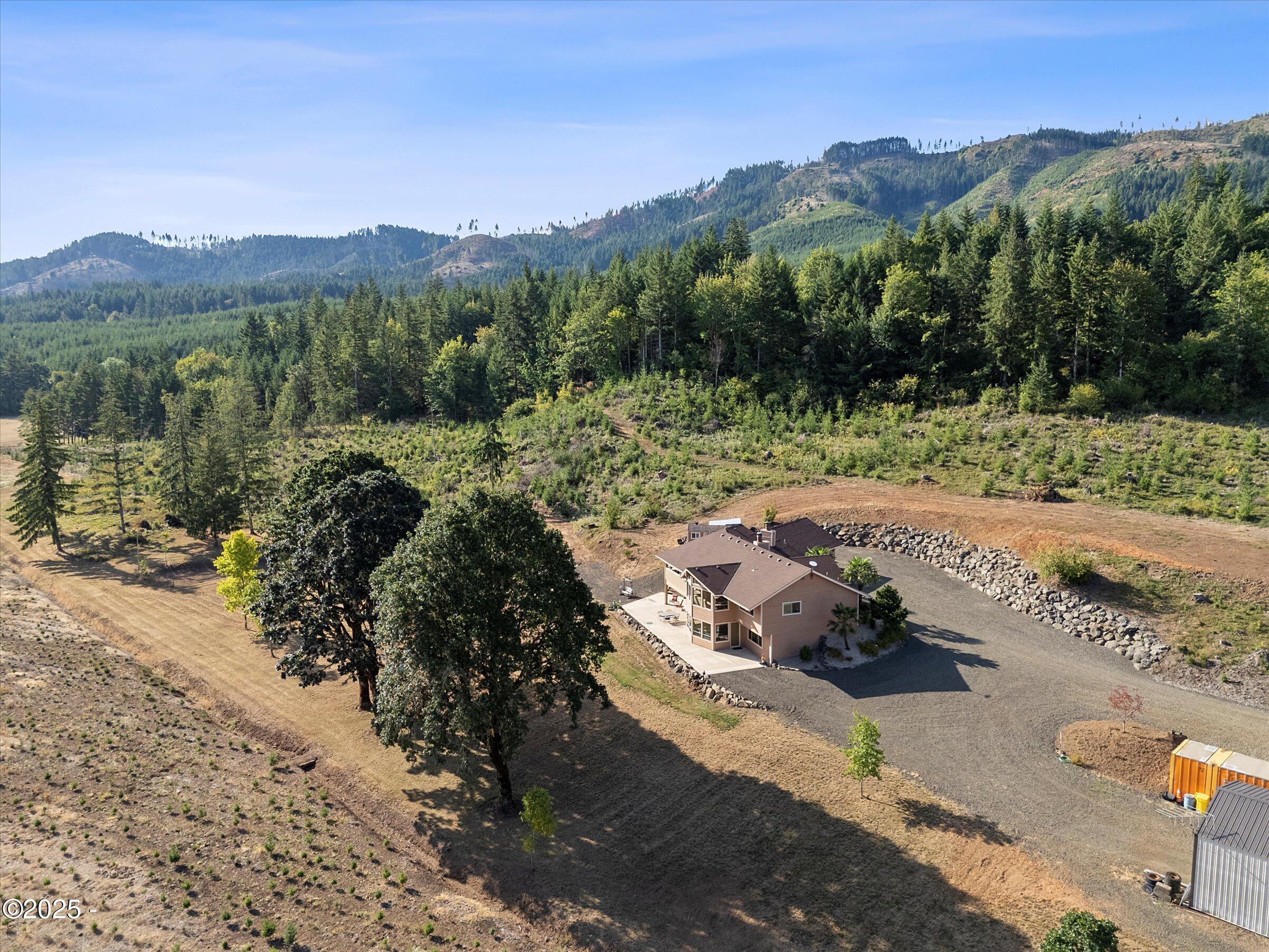 21560 Gooseneck Road Sheridan, OR 97378 - Photo 12 of 63 a view of a street with a mountain