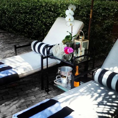 a view of a swimming pool with outdoor seating space