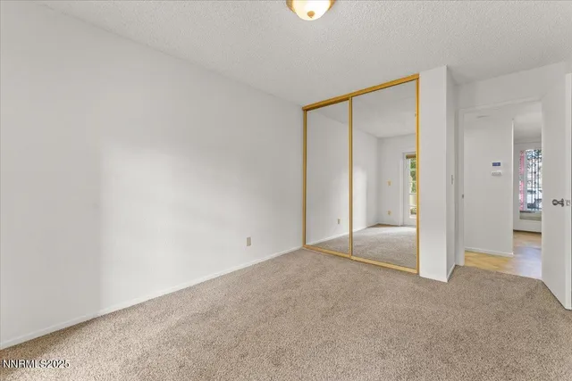 an empty room with a bathroom