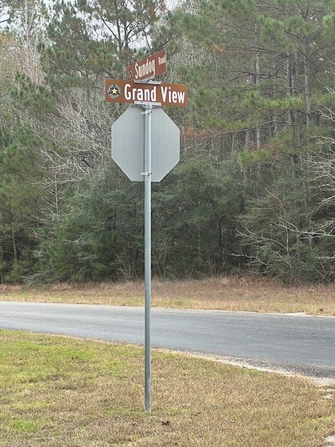 1-6-40 Sundog Road Huntsville, TX 77340 - Photo 1 of 8 a bathroom with a shower