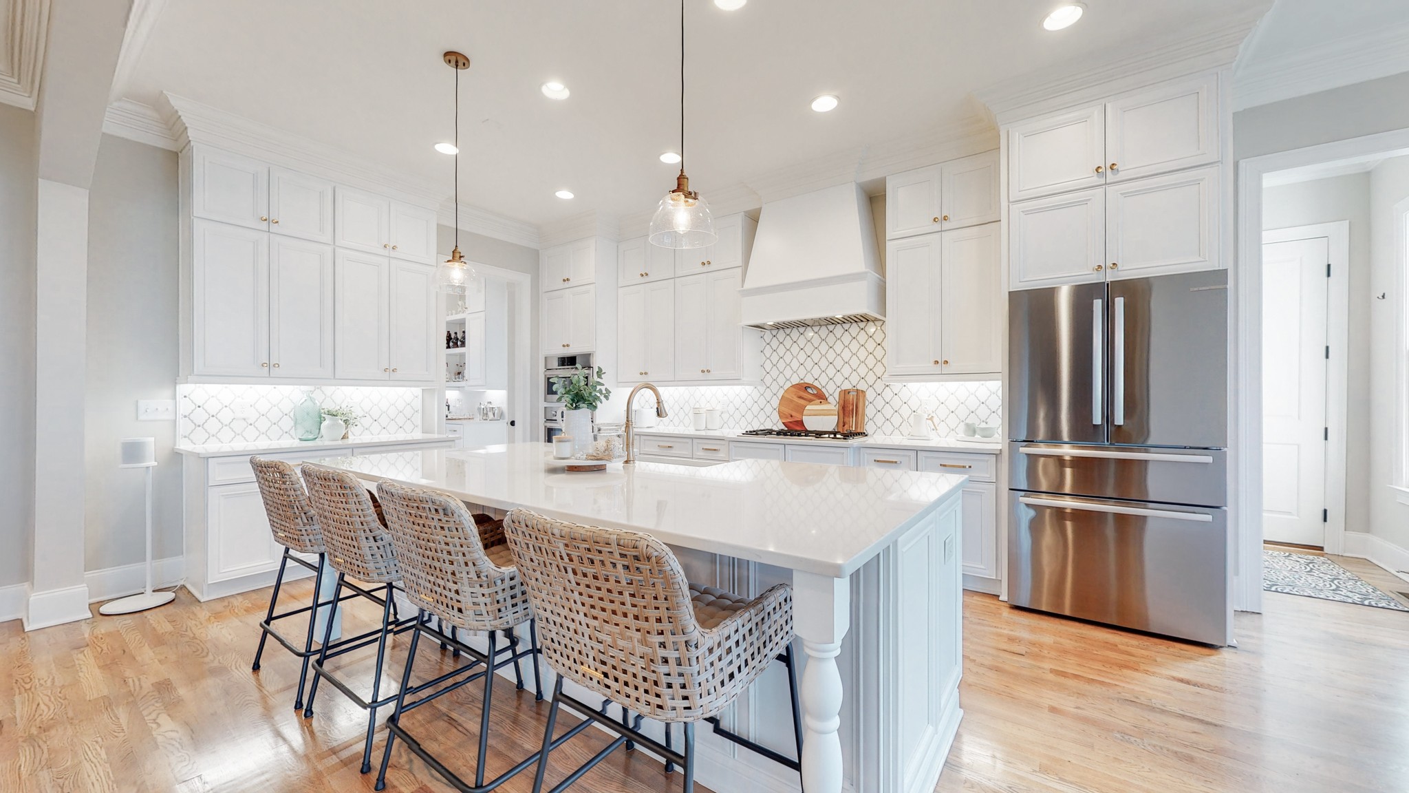 601 Rieves Circle Franklin, TN 37064 - Photo 13 of 37 a kitchen with kitchen island a refrigerator and a dining table