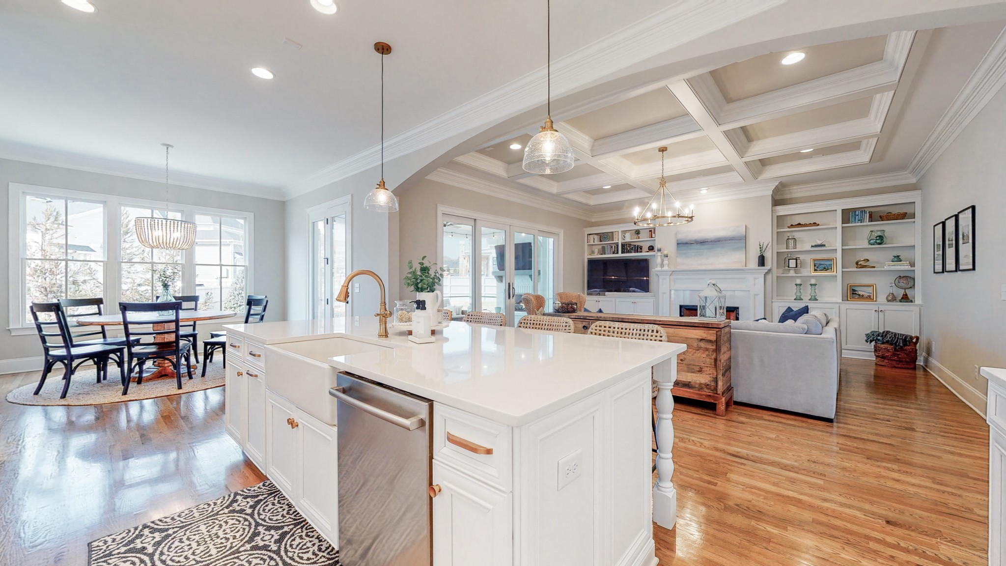 601 Rieves Circle Franklin, TN 37064 - Photo 14 of 37 a large white kitchen with lots of counter space a sink appliances and dining table