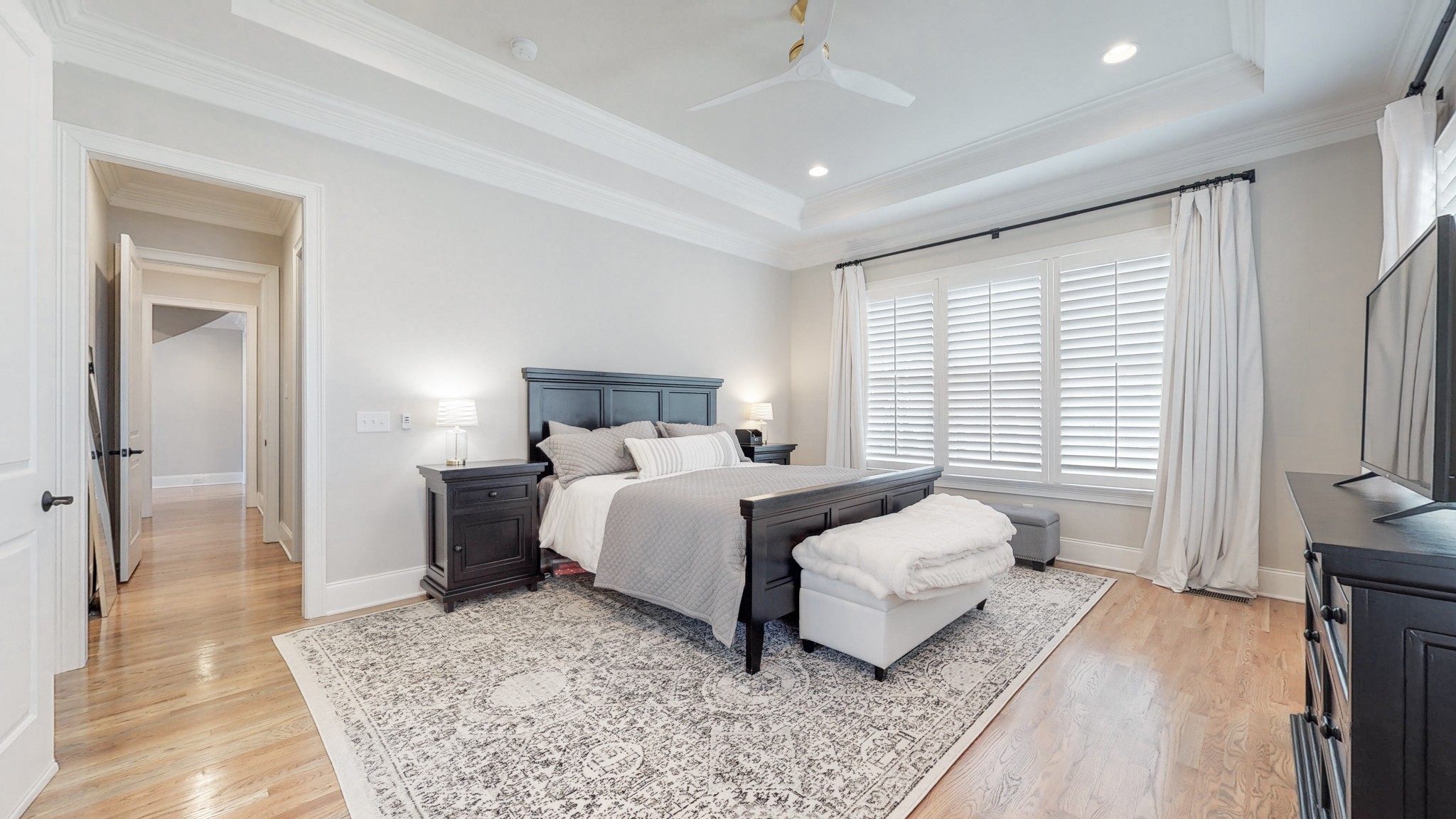 601 Rieves Circle Franklin, TN 37064 - Photo 17 of 37 a bedroom with a bed and a flat screen tv