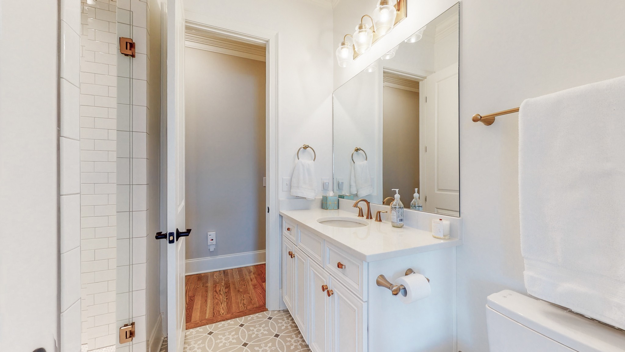 601 Rieves Circle Franklin, TN 37064 - Photo 26 of 37 a bathroom with a sink a mirror and a shower