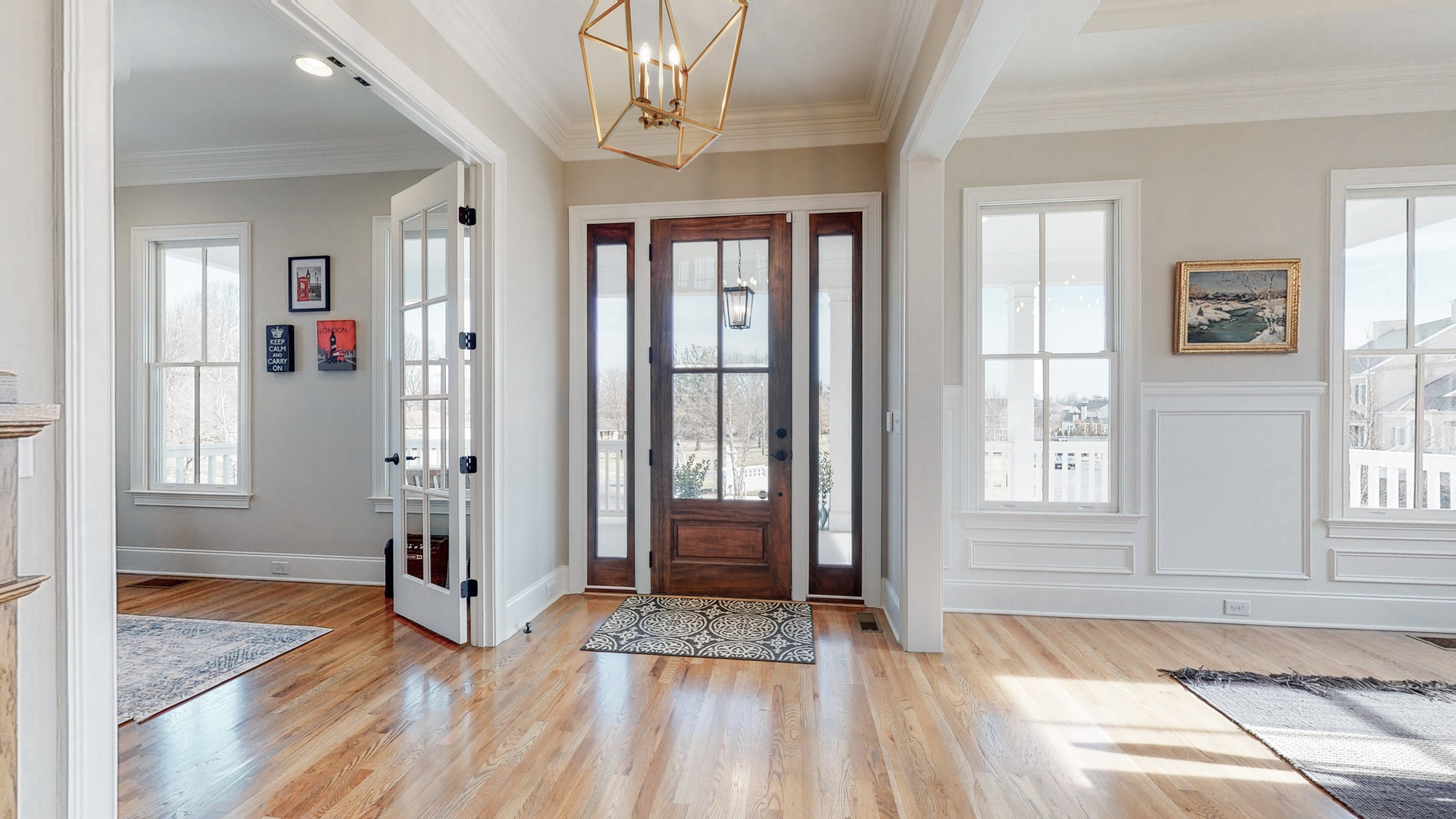601 Rieves Circle Franklin, TN 37064 - Photo 9 of 37 a view of a bedroom with wooden floor and windows