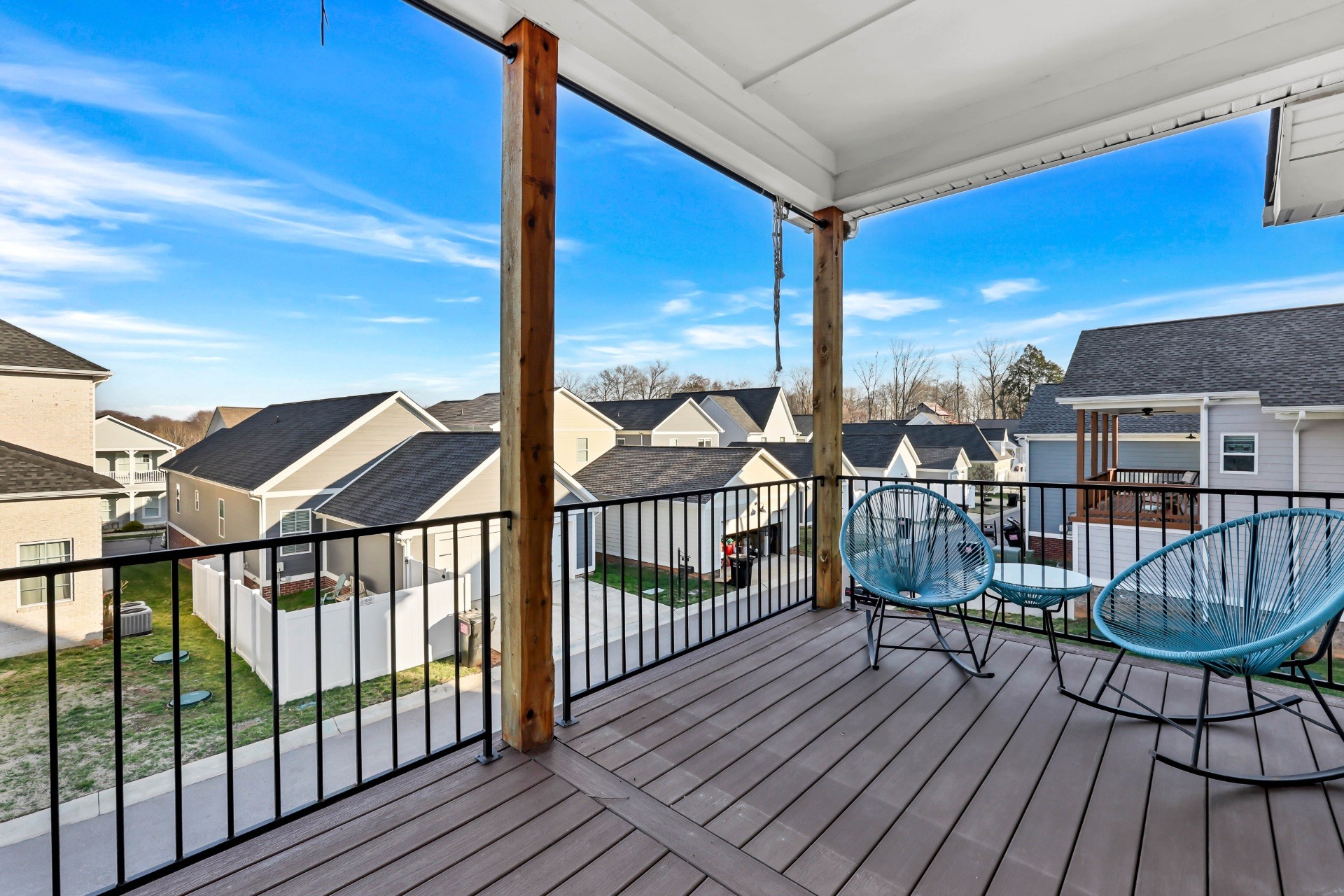 1372 Hicks Edgen Road Pleasant View, TN 37146 - Photo 34 of 37 a view of a balcony with chairs and wooden floor