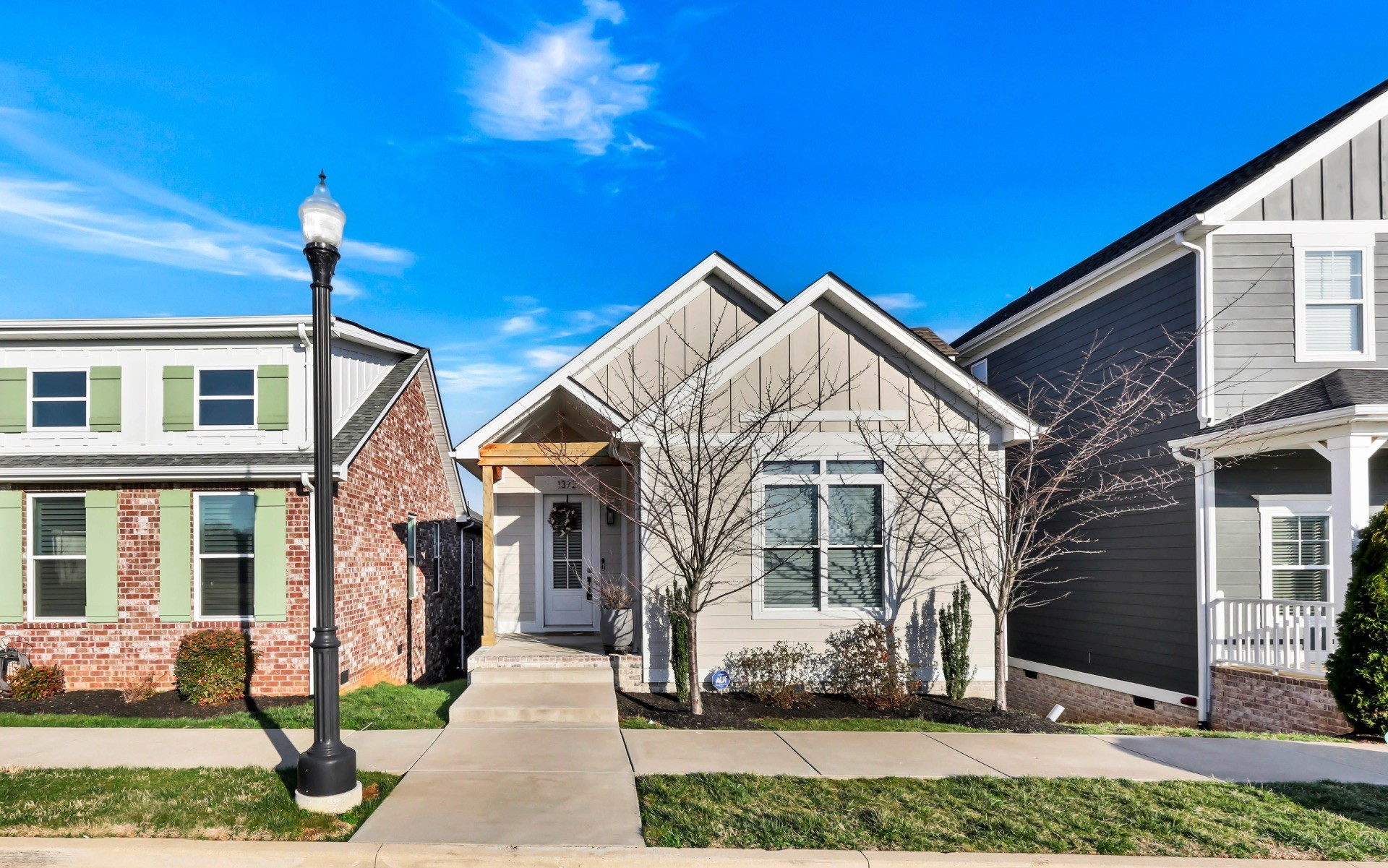 1372 Hicks Edgen Road Pleasant View, TN 37146 - Photo 4 of 37 a front view of a house with a yard
