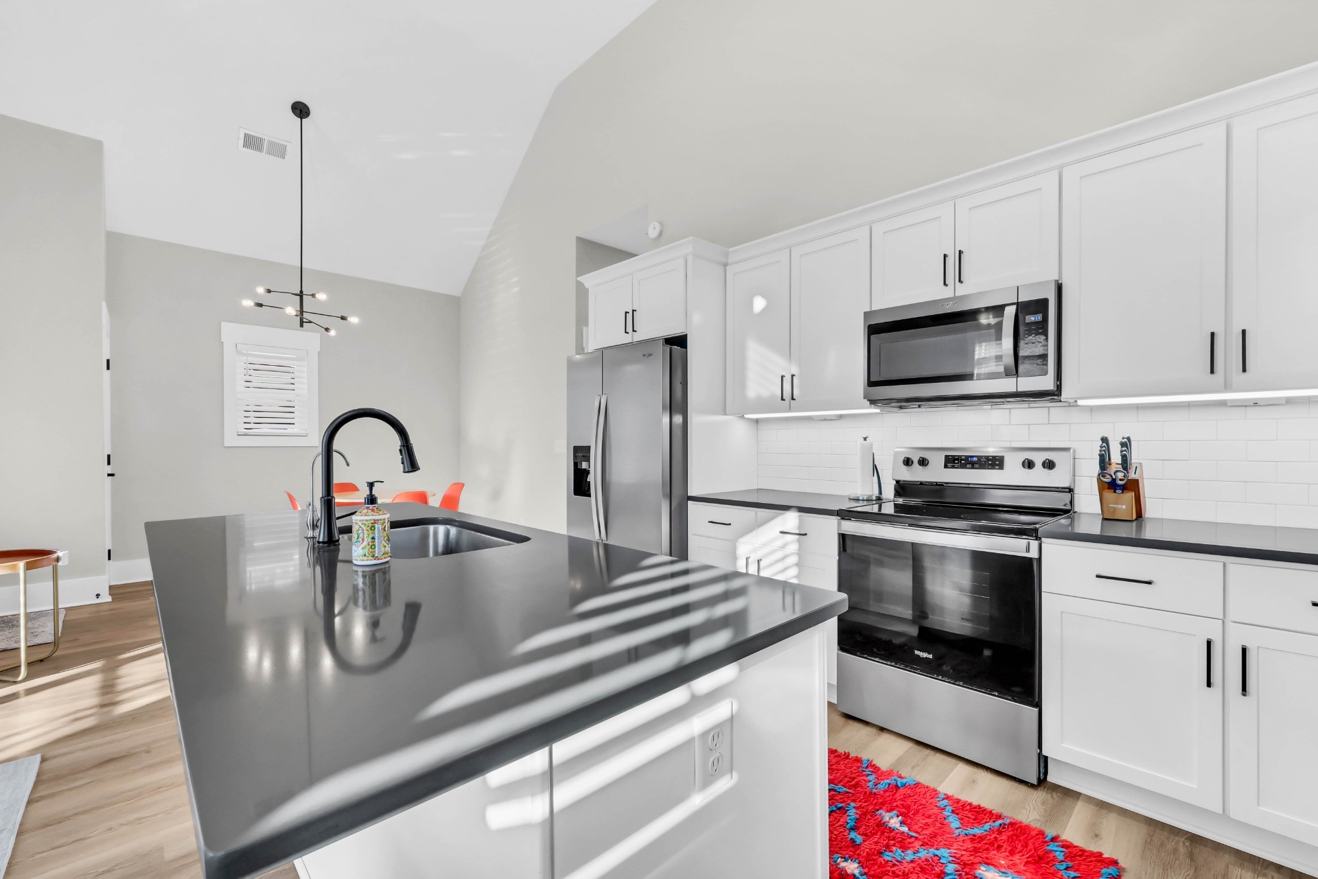 1372 Hicks Edgen Road Pleasant View, TN 37146 - Photo 9 of 37 a kitchen with stainless steel appliances granite countertop a stove a sink and a microwave
