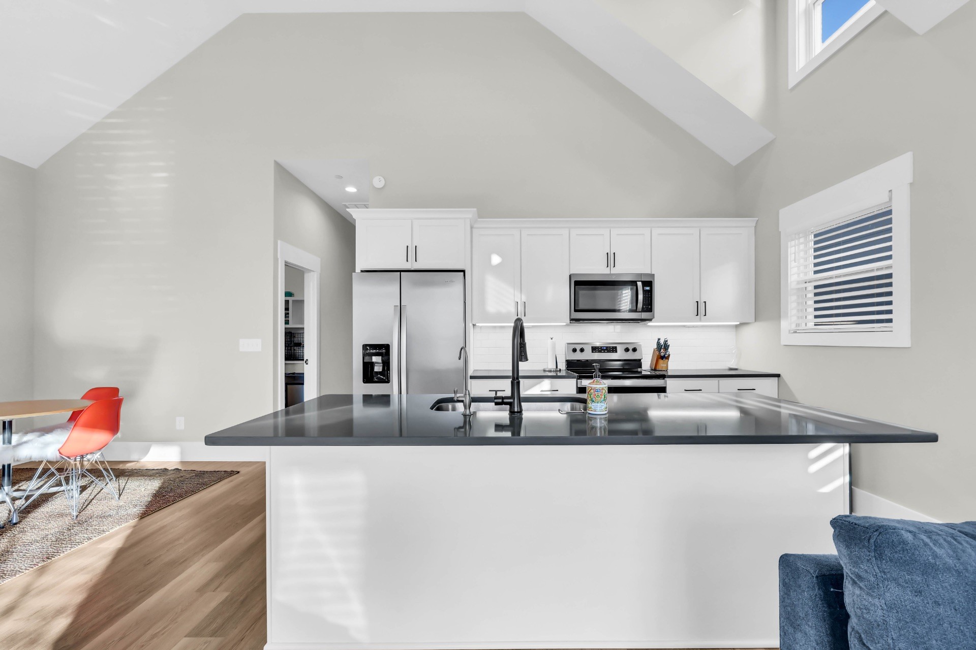 1372 Hicks Edgen Road Pleasant View, TN 37146 - Photo 10 of 37 a kitchen with stainless steel appliances granite countertop a sink refrigerator and microwave