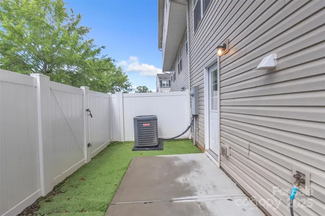 a view of a back yard of the house