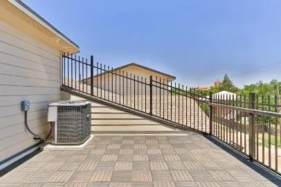 a view of a balcony with wooden floor