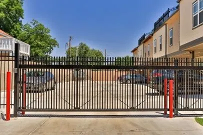 a view of a car park in front of house