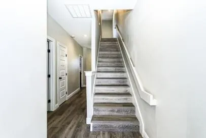 a view of a hallway with staircase