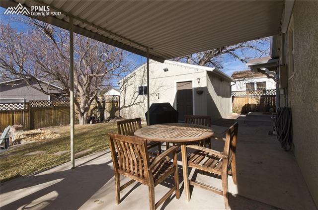 2446 Lafayette Road Colorado Springs, CO 80907 - Photo 14 of 17 The covered patio is great for those summer BBQ's!