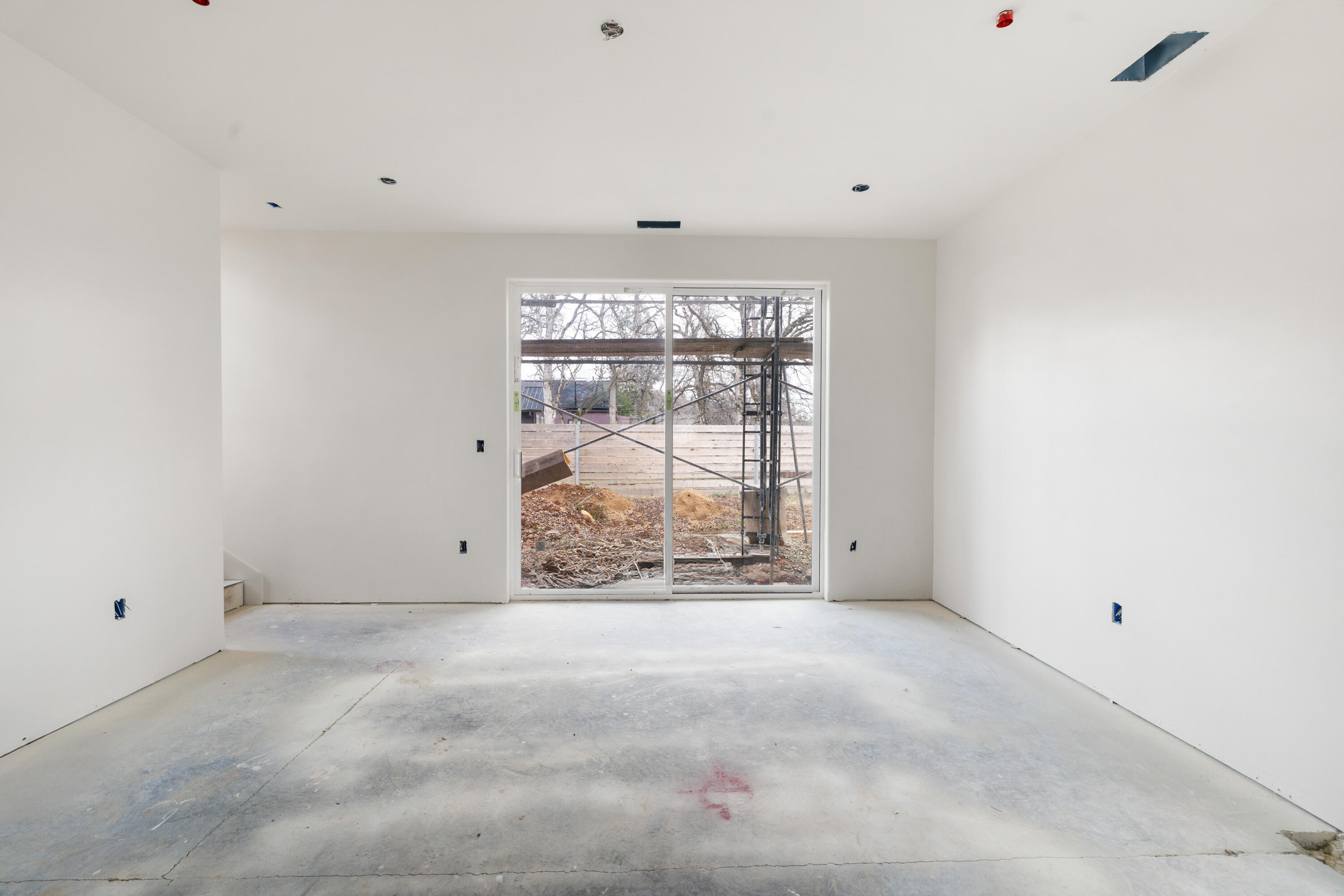 1319 Ridge Drive Redding, CA 96001 - Photo 12 of 29 a view of an empty room with a window