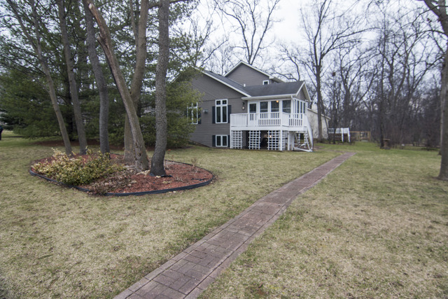 1437 Dresden Road Davis, IL 61019 - Photo 2 of 25 a front view of a house with a yard
