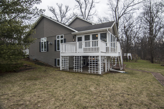 1437 Dresden Road Davis, IL 61019 - Photo 3 of 25 front view of a house with a yard