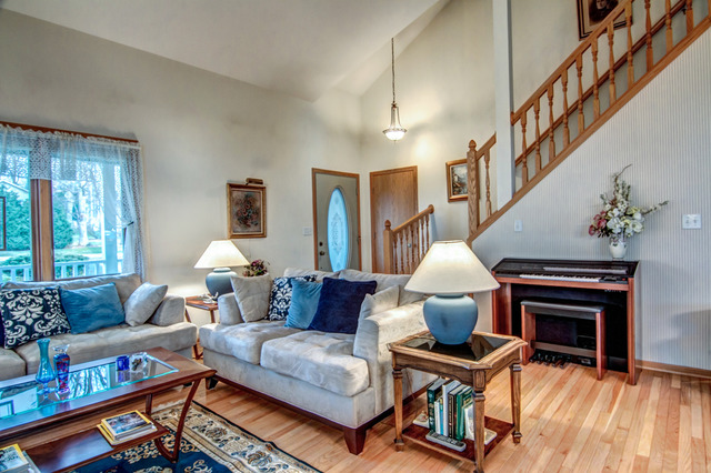 1437 Dresden Road Davis, IL 61019 - Photo 5 of 25 a living room with furniture a fireplace and a table