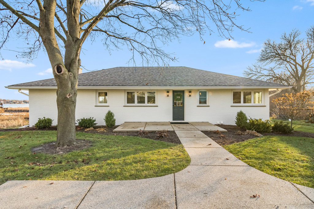26177 West Sunset Road Antioch, IL 60002 - Photo 1 of 1 a view of a house with a backyard