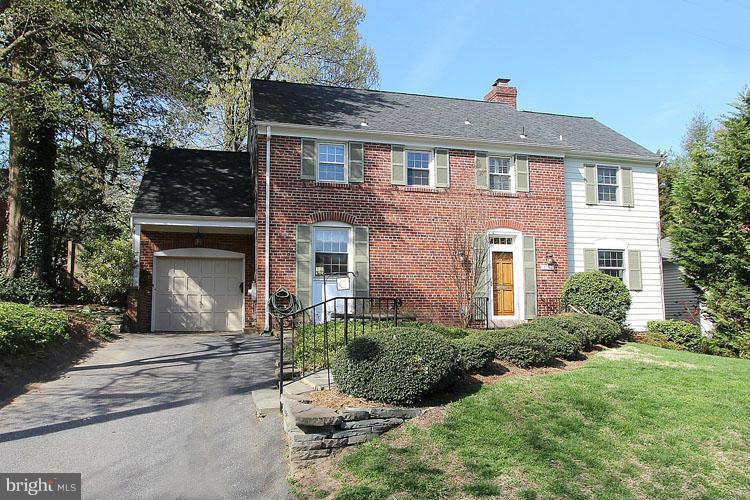 Exterior with driveway and mudroom entrance.