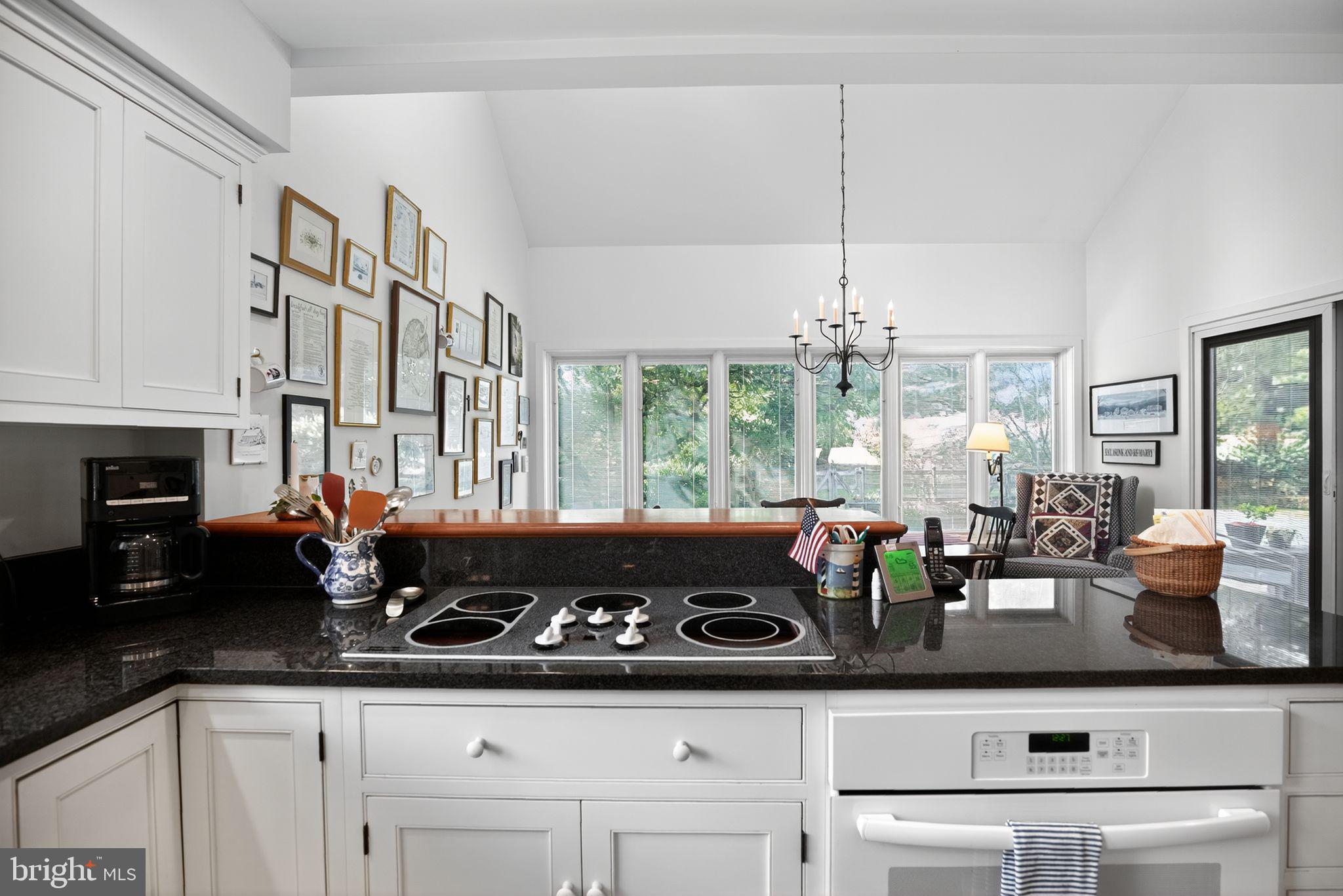 1 Fox Pond Place Spring House, PA 19477 - Photo 16 of 56 a kitchen with a stove and a white cabinets