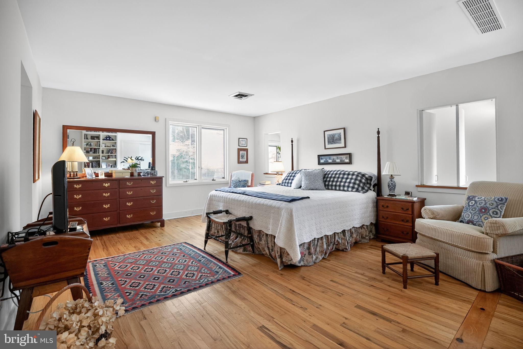 1 Fox Pond Place Spring House, PA 19477 - Photo 23 of 56 a bedroom with a bed and a couch