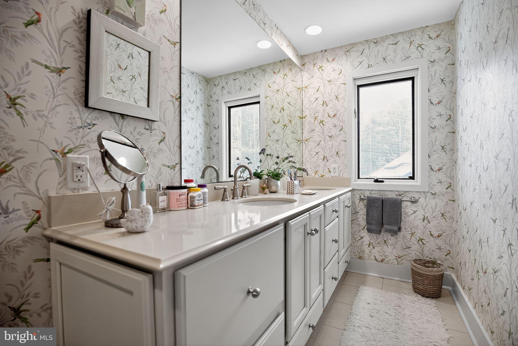 1 Fox Pond Place Spring House, PA 19477 - Photo 26 of 56 a bathroom with a double vanity sink and a mirror