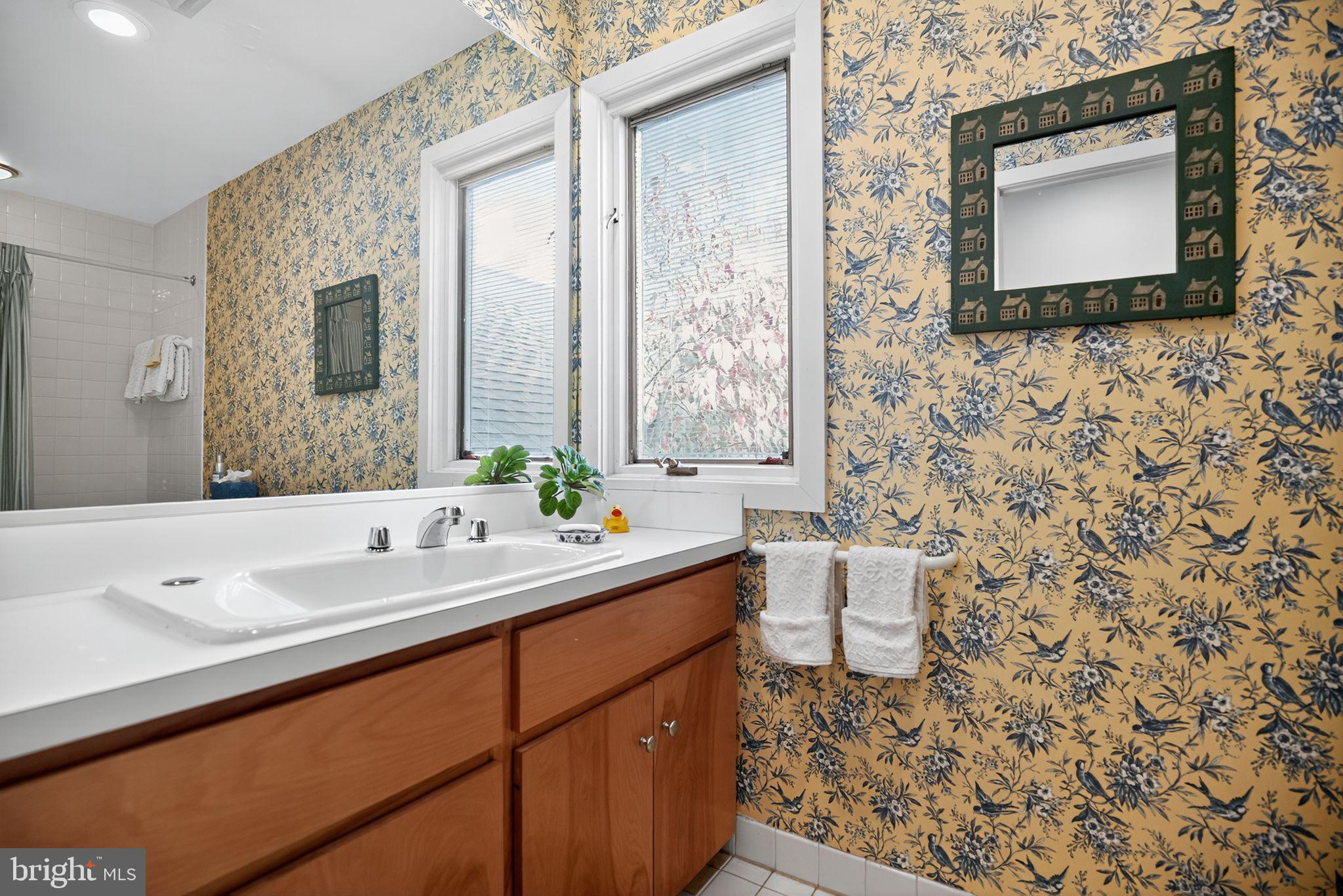 1 Fox Pond Place Spring House, PA 19477 - Photo 33 of 56 a bathroom with a sink a toilet and mirror