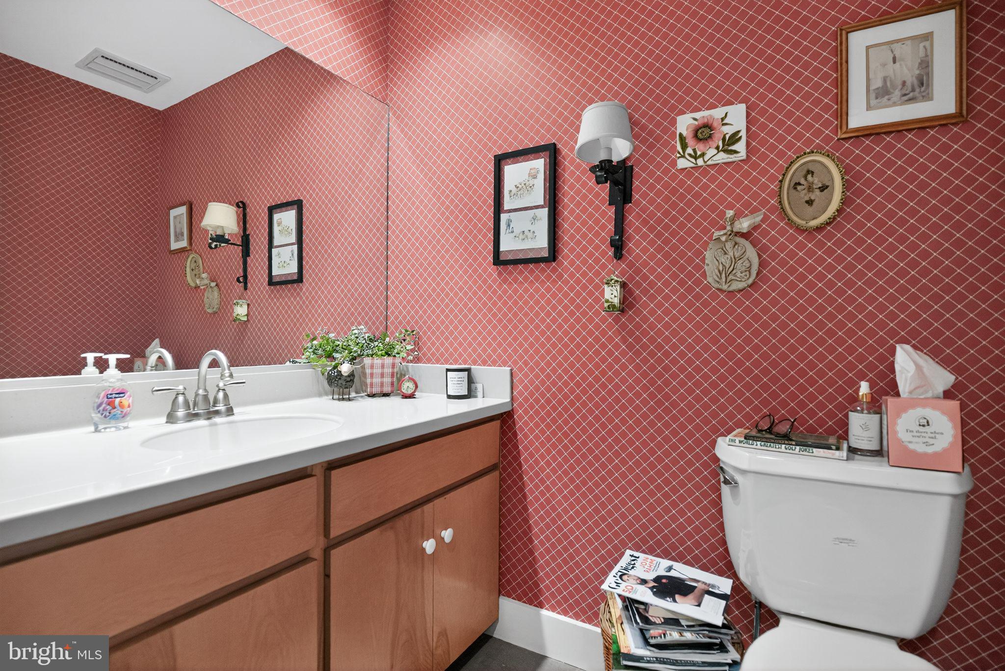 1 Fox Pond Place Spring House, PA 19477 - Photo 37 of 56 a bathroom with a sink mirror vanity and toilet