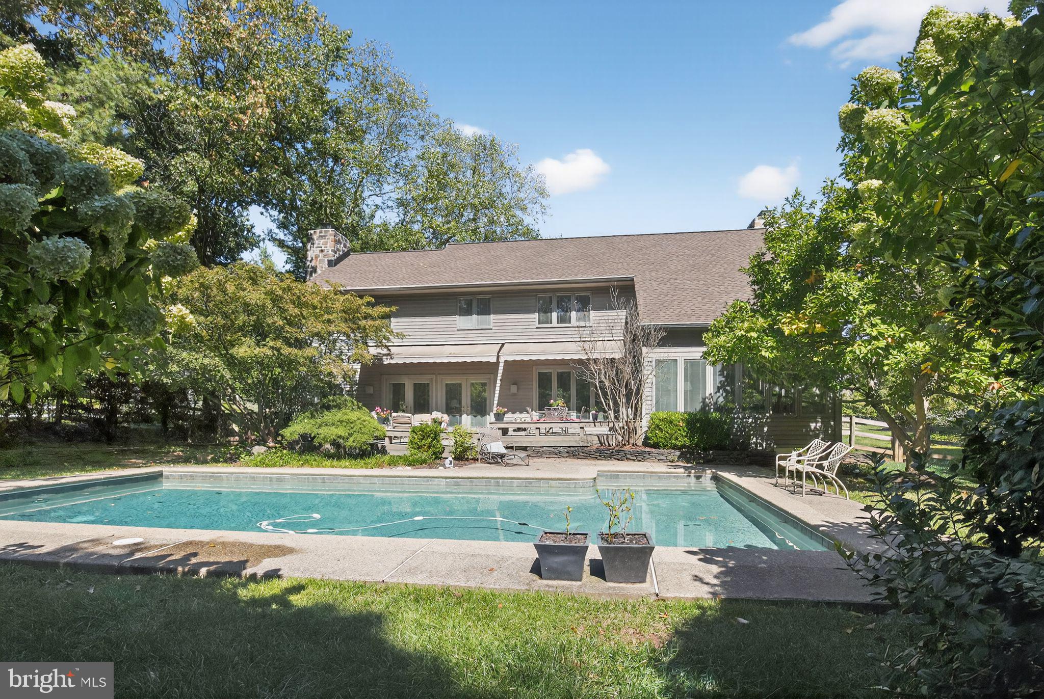 1 Fox Pond Place Spring House, PA 19477 - Photo 48 of 56 a front view of a house with a yard