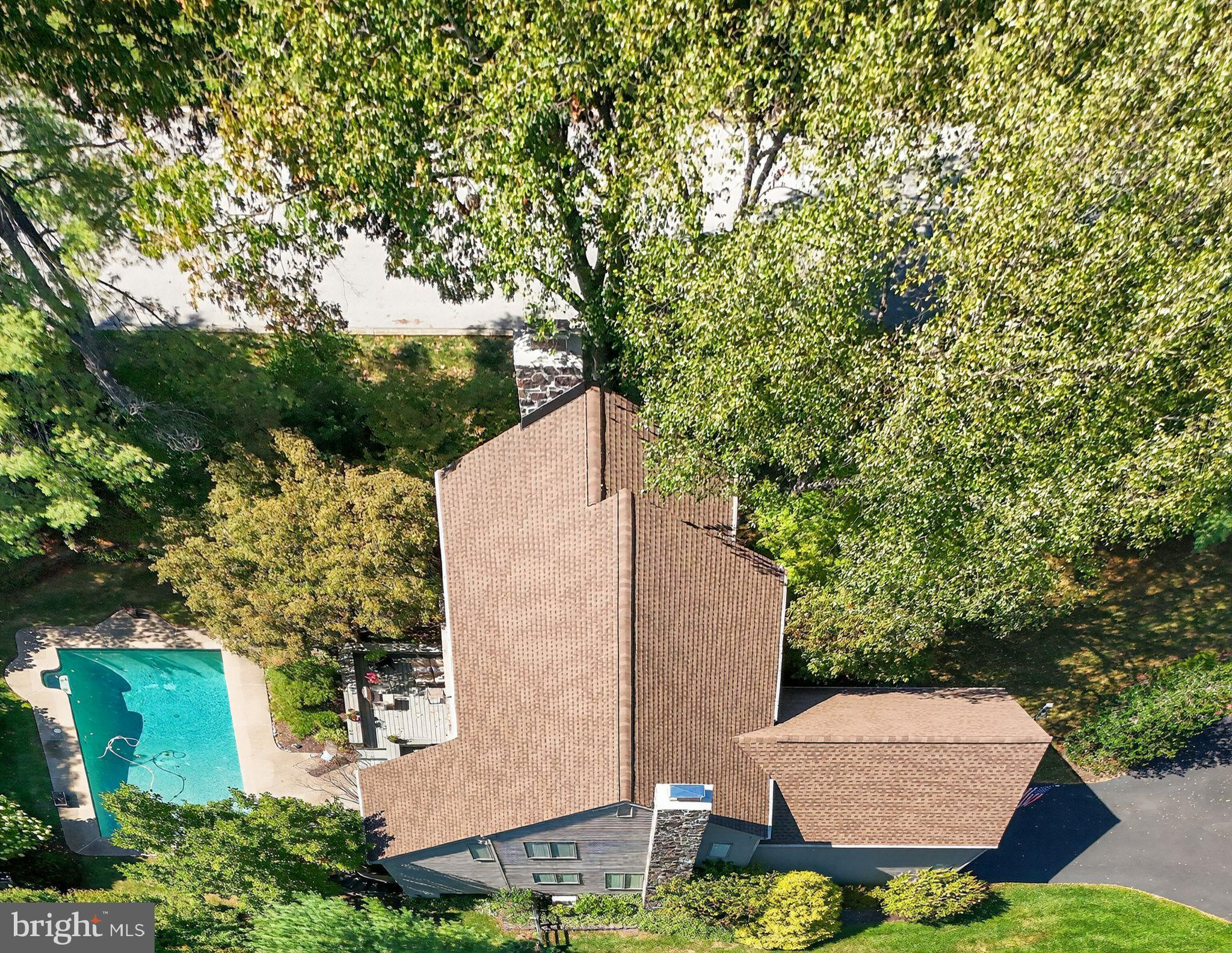 1 Fox Pond Place Spring House, PA 19477 - Photo 52 of 56 an aerial view of a house with yard and outdoor seating