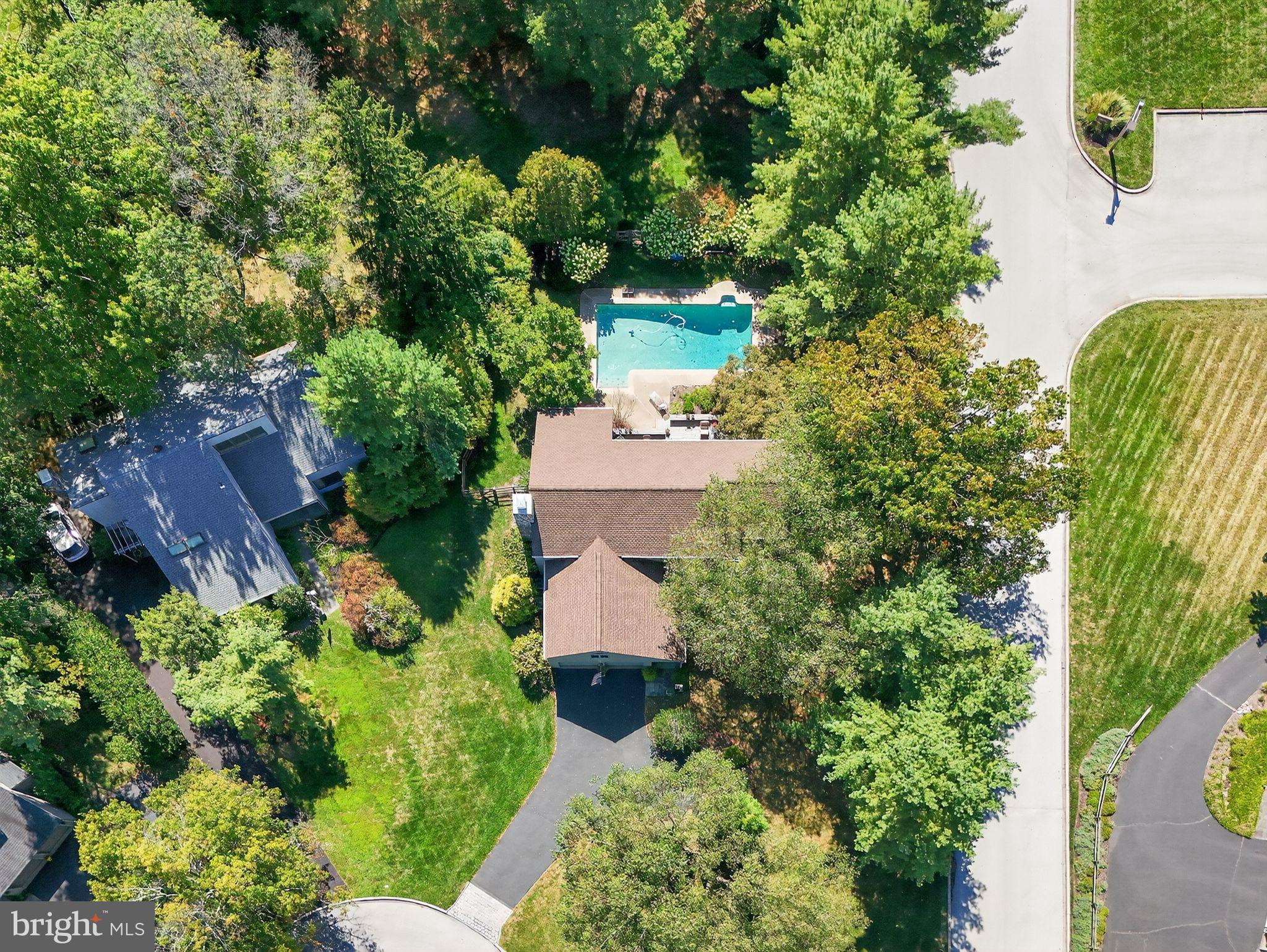 1 Fox Pond Place Spring House, PA 19477 - Photo 53 of 56 an aerial view of a house with a yard and garden