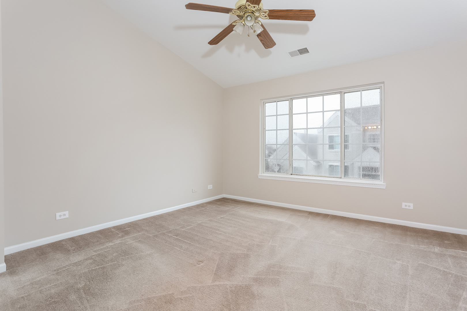 3462 Ravinia Circle Aurora, IL 60504 - Photo 8 of 17 an empty room with a window