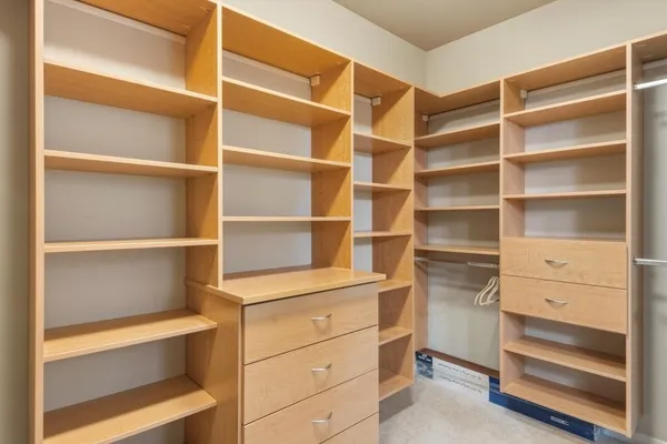 a view of a workspace with wooden floor and bathroom