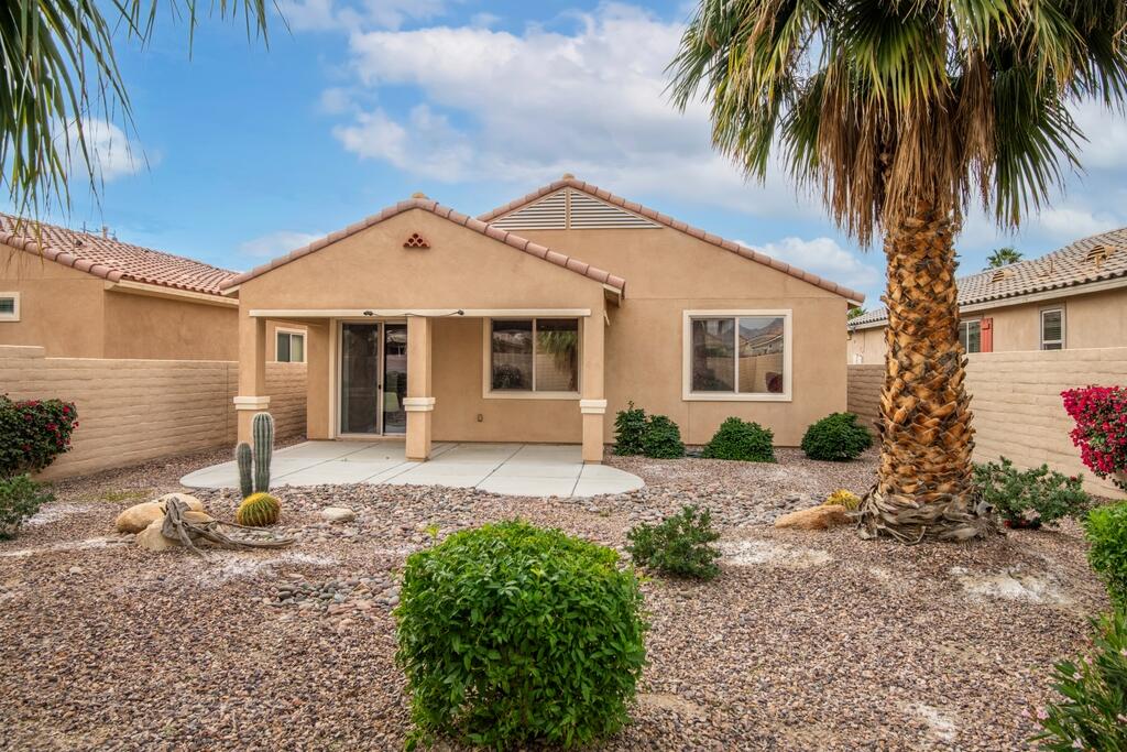 40090 Corte Refugio Indio, CA 92203 - Photo 22 of 50 a front view of a house with a yard and garage