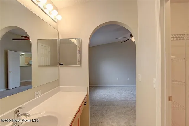 a bathroom with a tub and shower