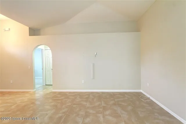 an empty room with a natural light