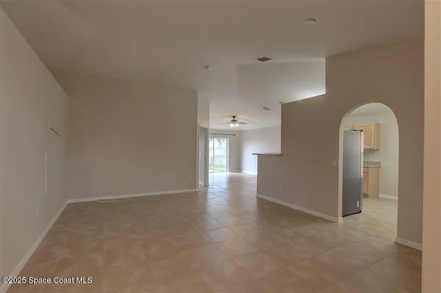 a view of a room with entryway white walls and stairs