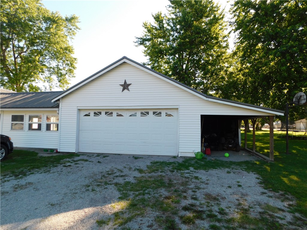 1301 East Main Street Casey, IL 62420 - Photo 7 of 14 a view of a house with a yard