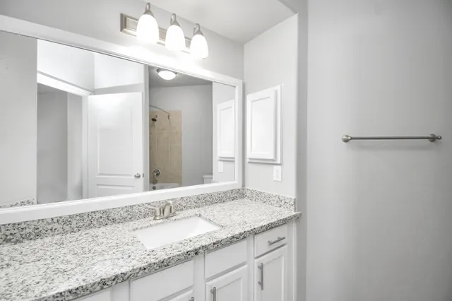 a swimming pool with outdoor seating and yard