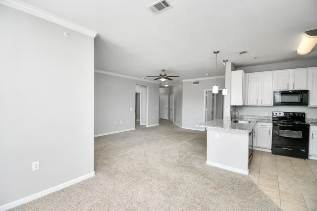 a view of a building with sitting area