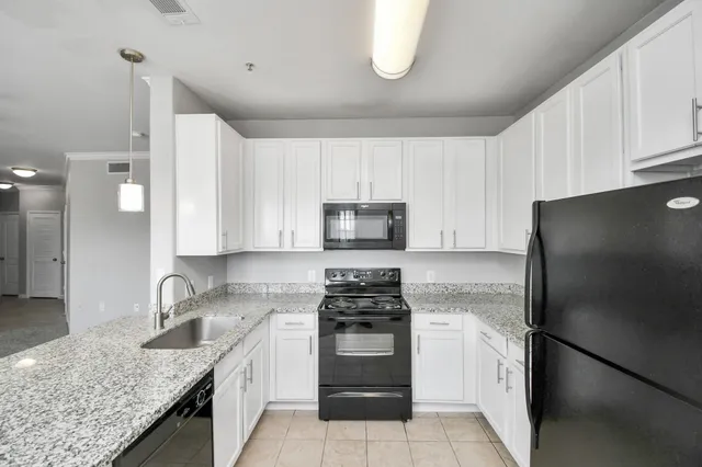 a view of a cafe with sitting area