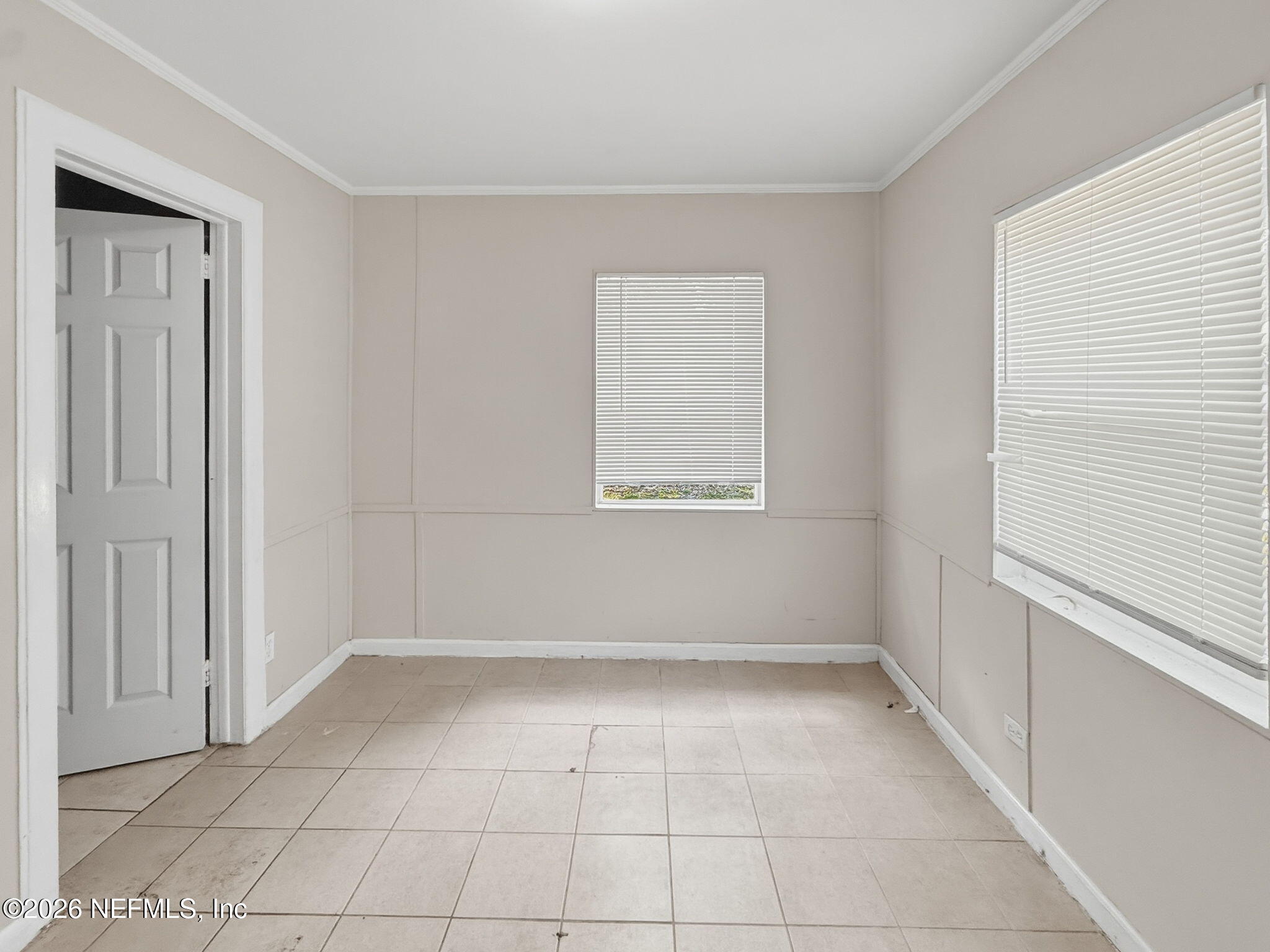 326 Cahoon Road South Jacksonville, FL 32220 - Photo 20 of 34 a view of an empty room with a window