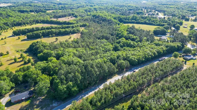 a view of a lake with a city