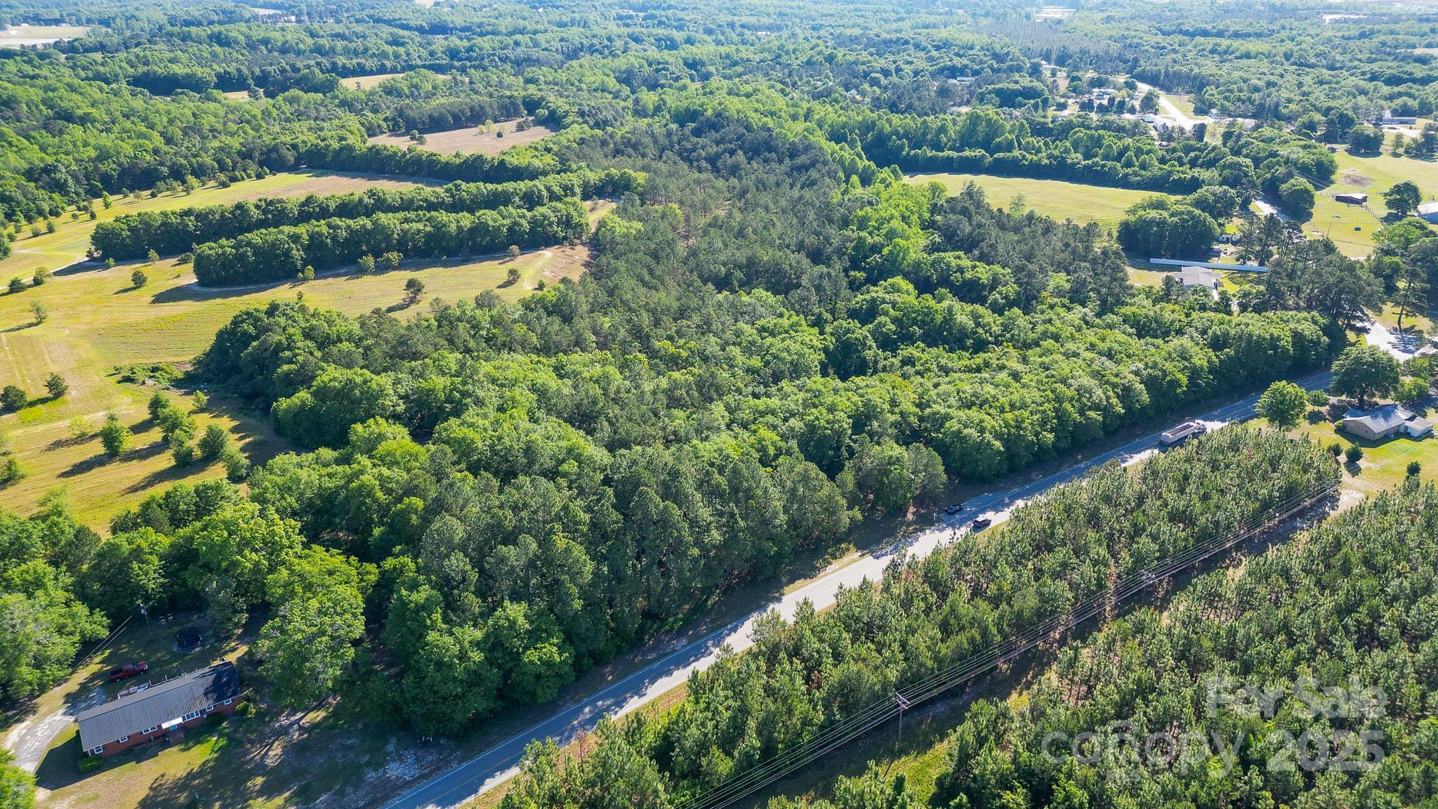 0 Airport Road Pageland, SC 29728 - Photo 28 of 46 a view of a lake with a city