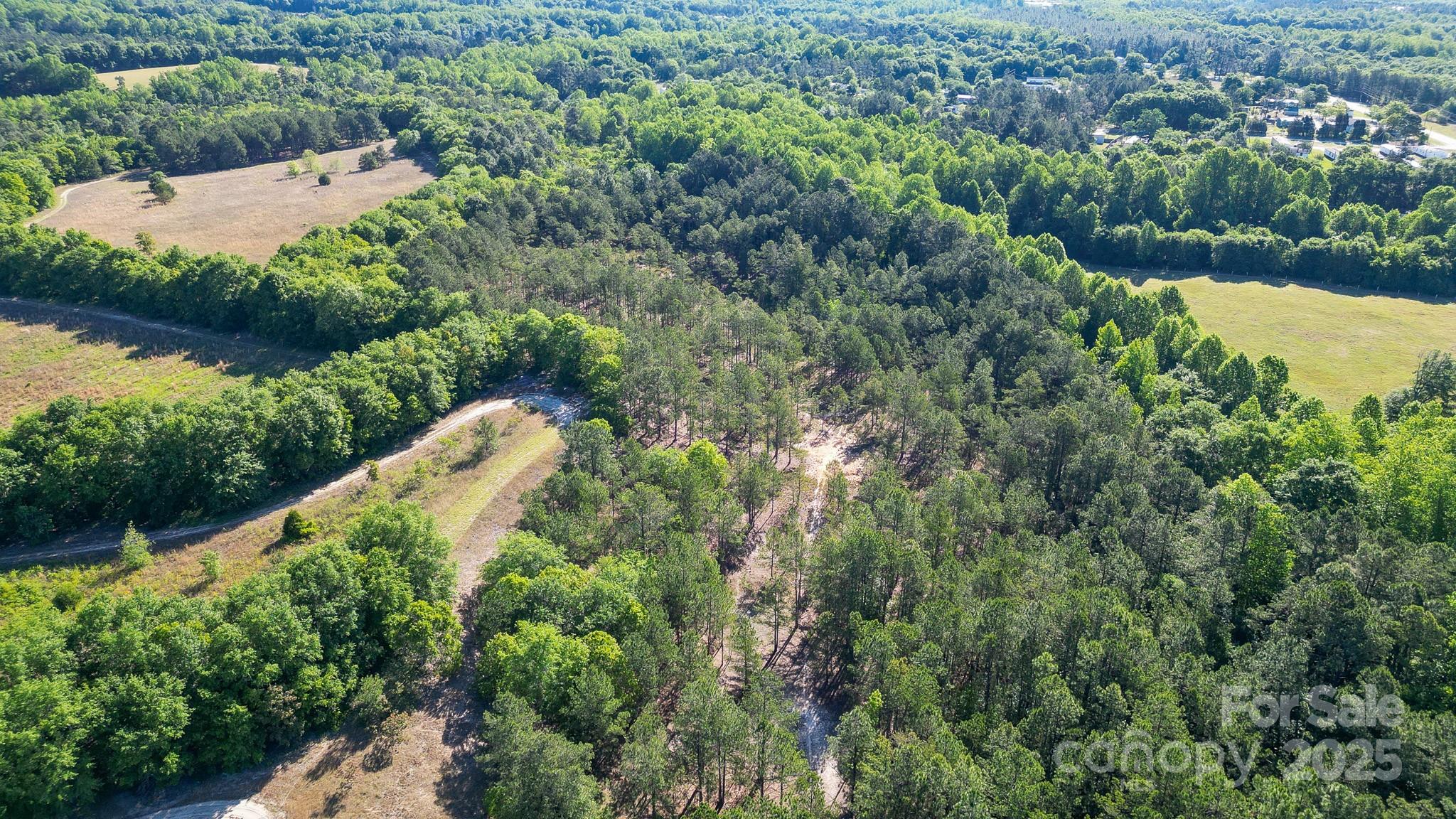 0 Airport Road Pageland, SC 29728 - Photo 43 of 46 an aerial view of a house with a yard and lake view