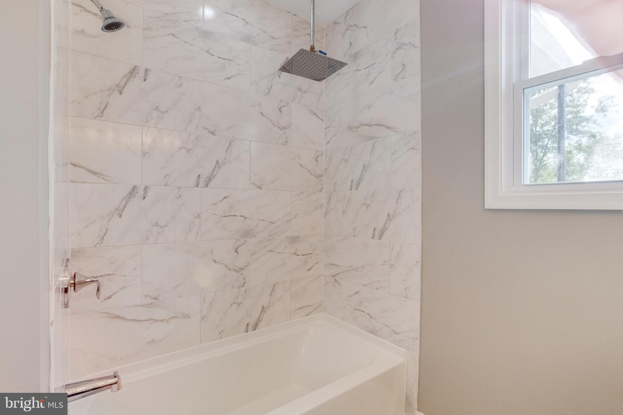 1209 Krueger Avenue Rosedale, MD 21237 - Photo 39 of 74 Shower with Tile Surround