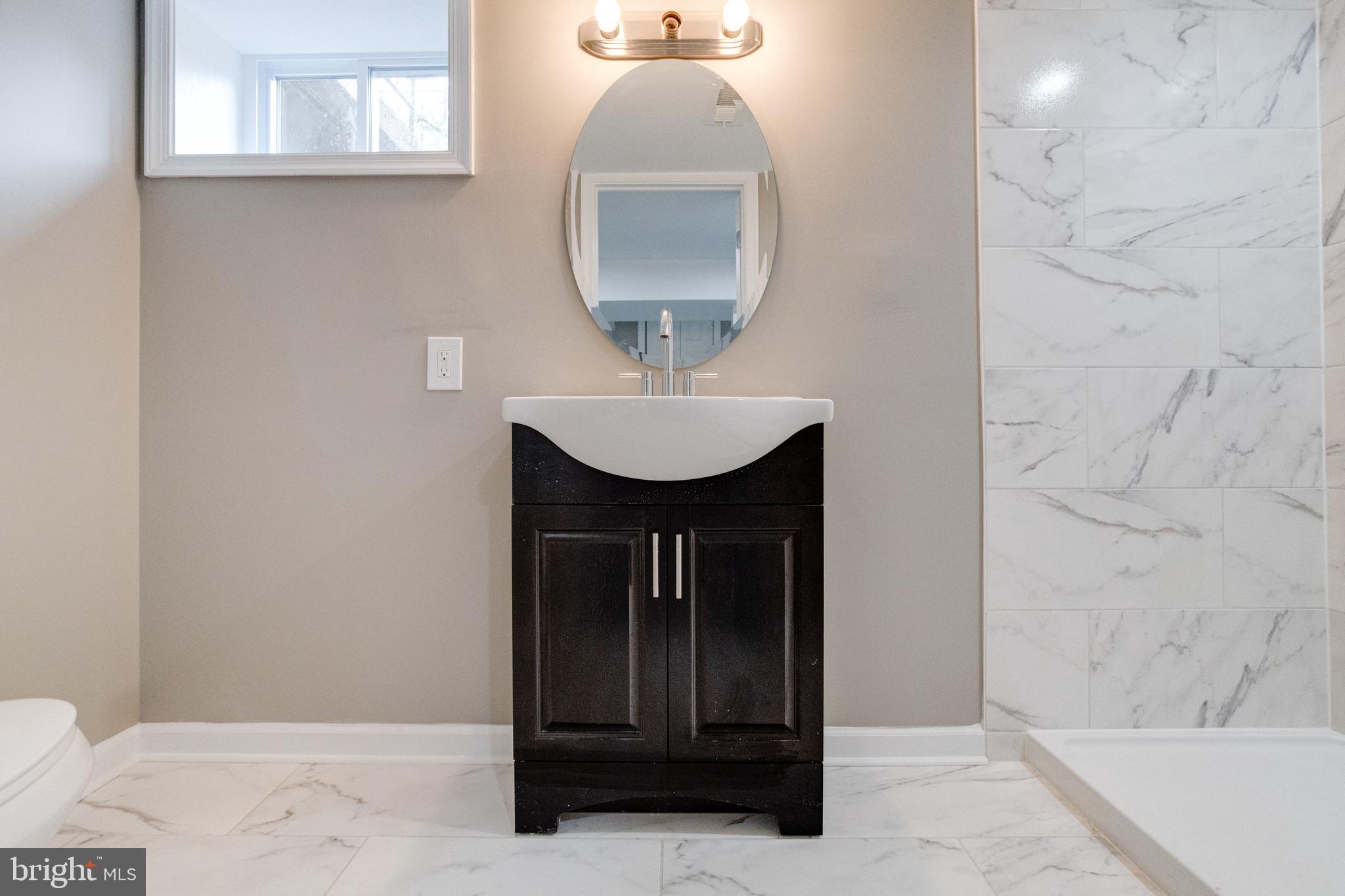 1209 Krueger Avenue Rosedale, MD 21237 - Photo 66 of 74 Full Lower Level Bath with Tile Surround