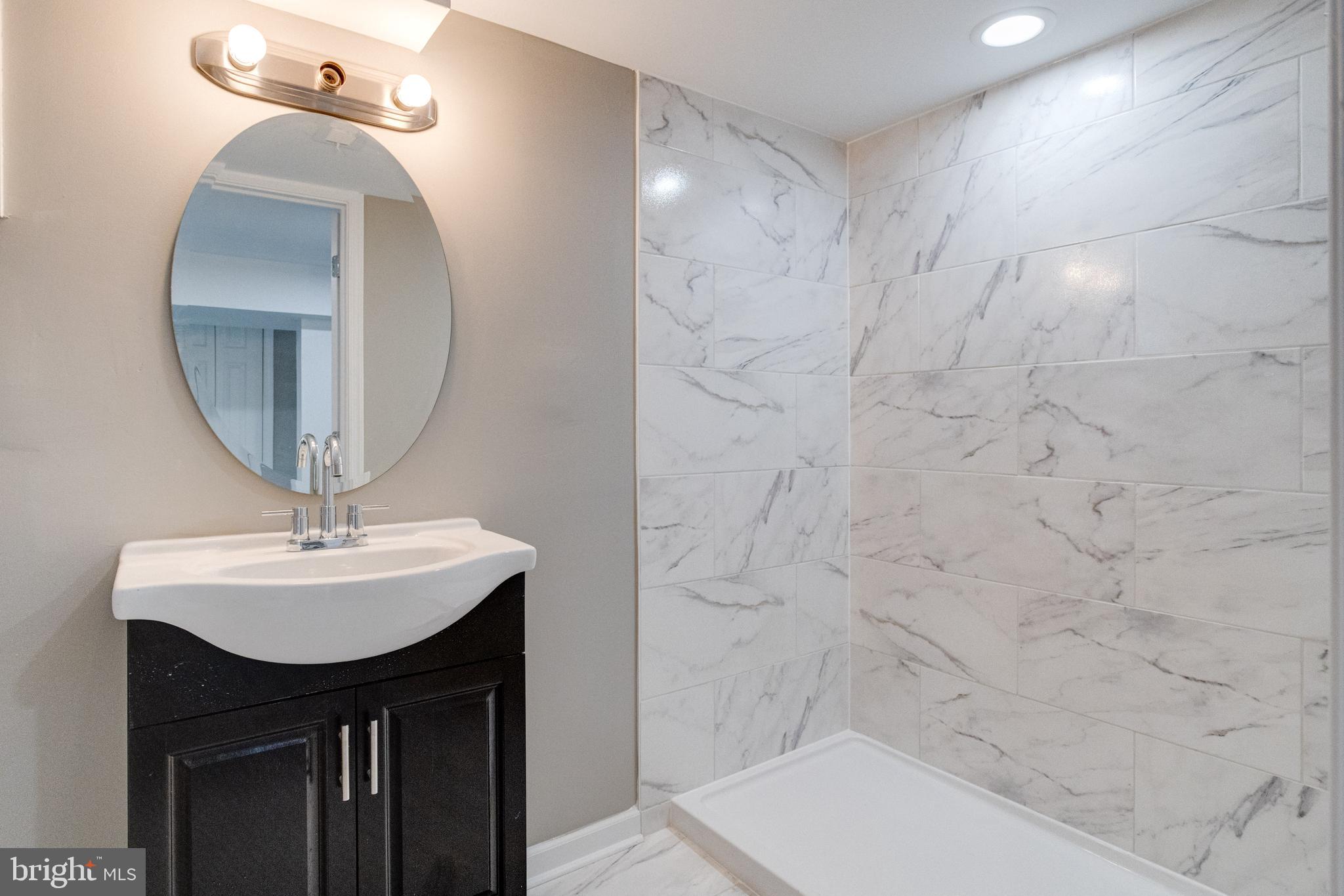 1209 Krueger Avenue Rosedale, MD 21237 - Photo 67 of 74 Full Lower Level Bath with Tile Surround