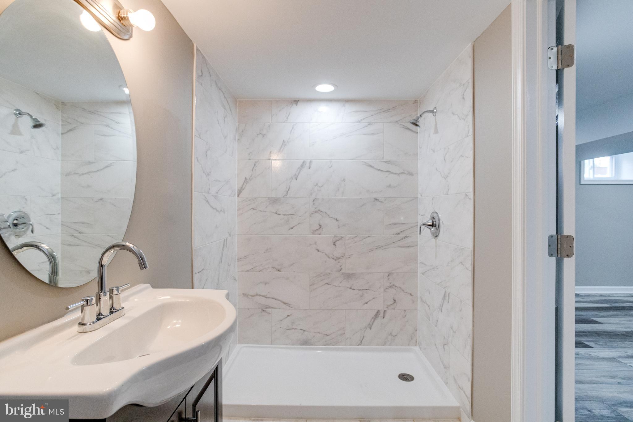 1209 Krueger Avenue Rosedale, MD 21237 - Photo 68 of 74 Full Lower Level Bath with Tile Surround